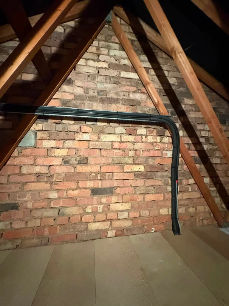 Air conditioning pipework routed neatly through the loft during a multi-split installation in Halesowen