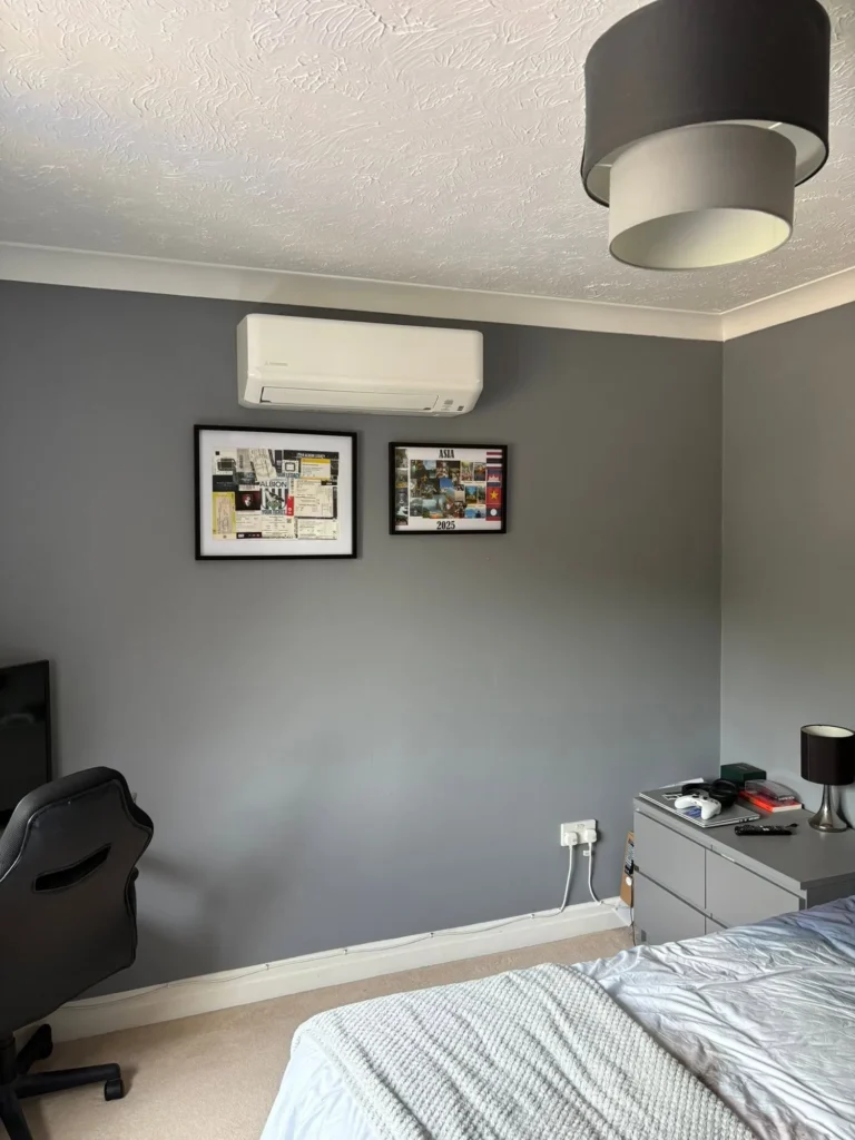 Mitsubishi wall-mounted air conditioning installed in a bedroom at a home in Droitwich