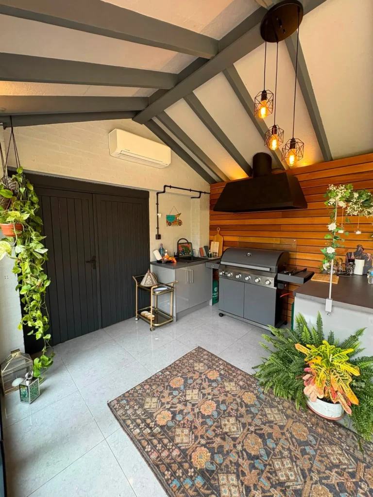 Mitsubishi wall-mounted air conditioning unit providing heating and cooling in a Stourbridge garden room