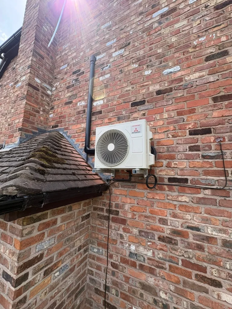 Mitsubishi bedroom air conditioning unit installed neatly in a Droitwich home